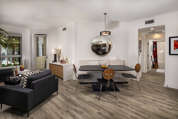 Elegant dining area with modern furnishings at Clarendon Apartments