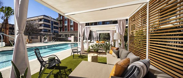 Luxurious rooftop pool at Clarendon Apartments offering stunning views of the city skyline