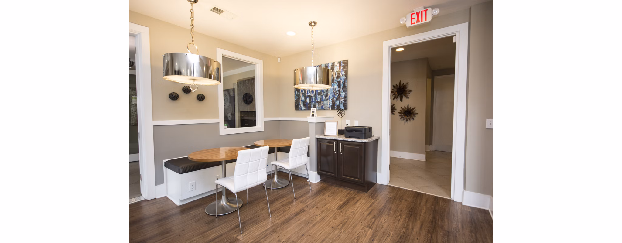 Modern business center with sleek workstations at Tryon Place Apartments, offering luxury amenities and convenience for residents