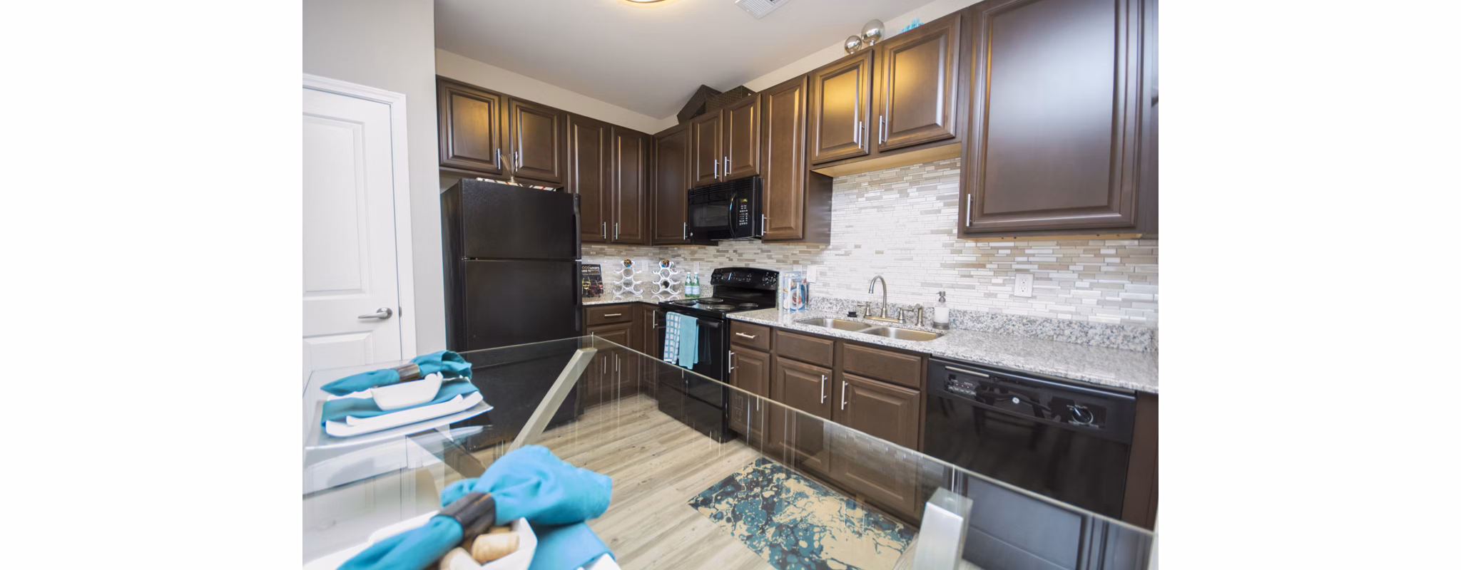 Spacious clubhouse featuring modern decor at Tryon Place Apartments, ideal for gatherings and events
