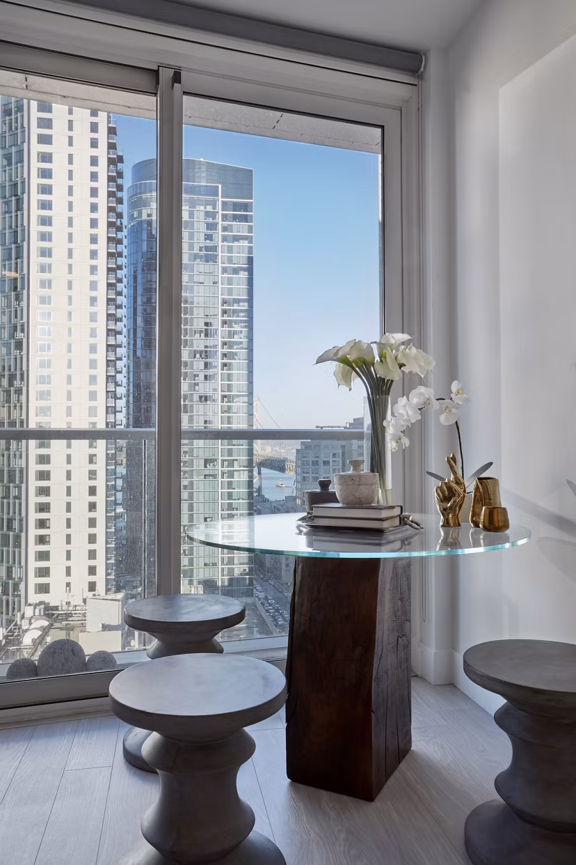 Dining room with modern decor and elegant lighting at Jasper Apartments