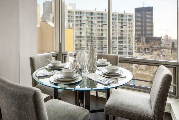 Elegant dining room with modern decor and ambient lighting at Edgewater Apartments, showcasing sophistication and style for luxury living