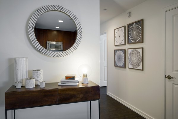 Sleek hallway with modern lighting at Edgewater Apartments