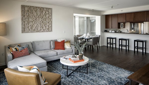 Spacious living room with modern decor at Edgewater Apartments