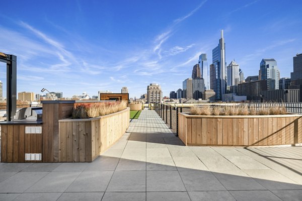 Rooftop deck offering panoramic city views at Edgewater Apartments, ideal for enjoying luxury outdoor living