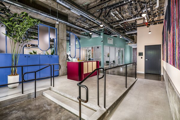 Elegant clubhouse lobby with modern decor at WILCO Apartments, offering luxury amenities in a welcoming space