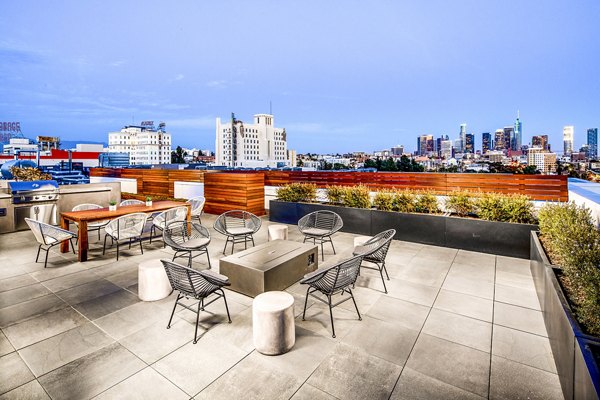WILCO Apartments: Private patio/balcony with stylish outdoor seating, perfect for relaxation and city views