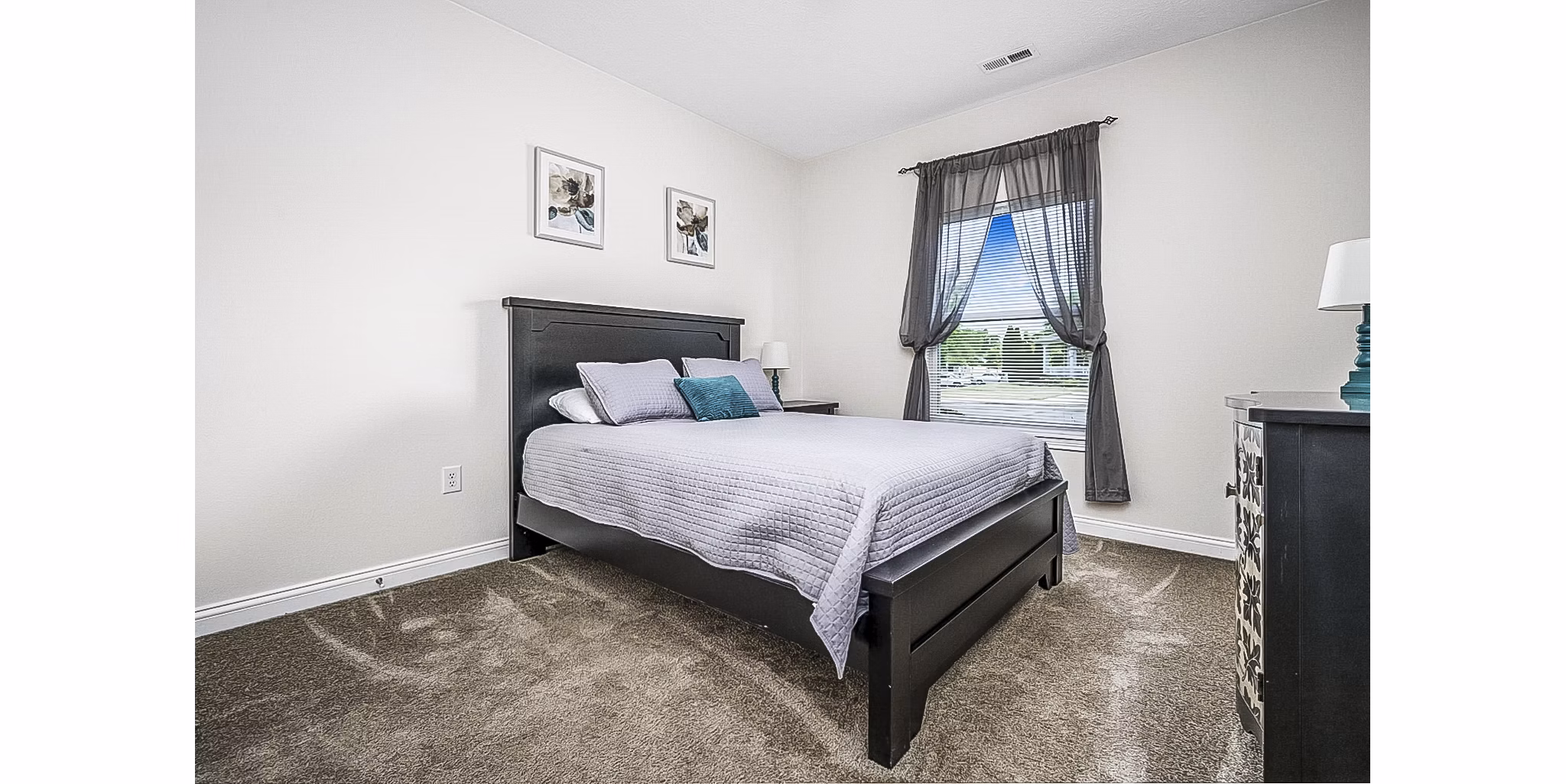 Bedroom featuring elegant design elements at Copper Chase at Stones Crossing Apartments