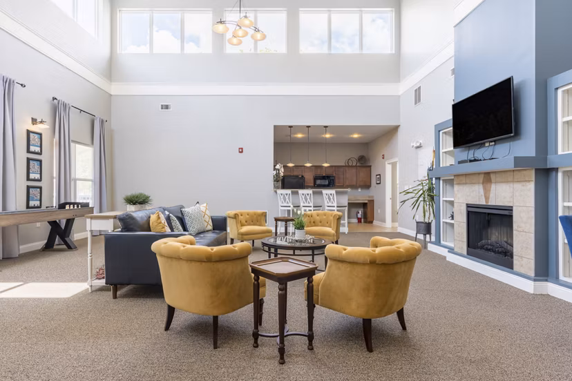 Modern clubhouse with stylish seating at Copper Chase at Stones Crossing Apartments in a luxury setting