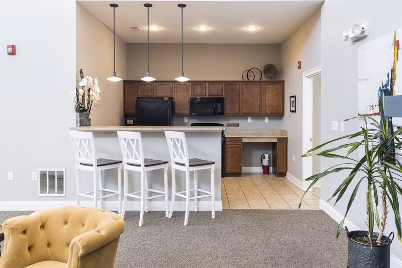 Business center with modern workstations at Copper Chase at Stones Crossing Apartments Ideal workspace for residents seeking productivity and convenience