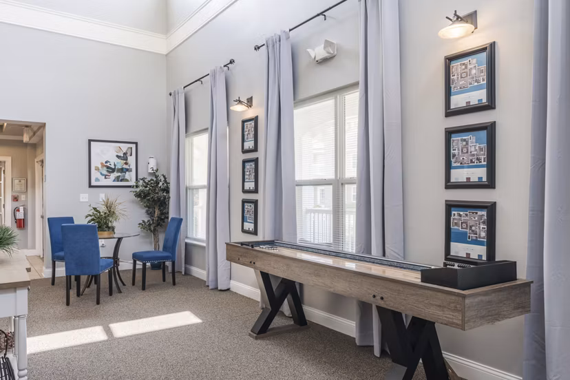 Modern clubhouse featuring chic design and comfortable seating at Copper Chase at Stones Crossing Apartments
