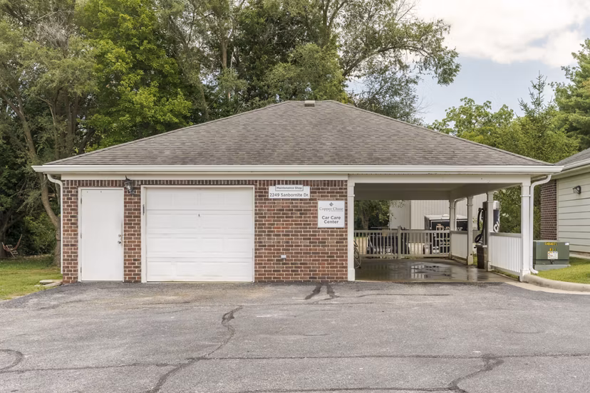 Convenient car care station at Copper Chase at Stones Crossing Apartments for easy vehicle maintenance