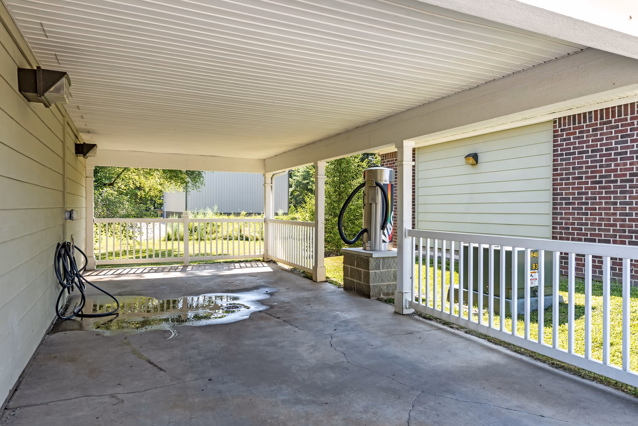 Convenient car care station at Copper Chase at Stones Crossing Apartments for easy vehicle maintenance