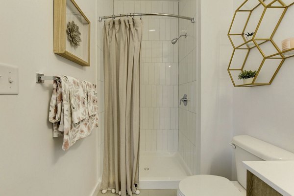 Bathroom featuring modern fixtures and spacious vanity in Wheelhouse Apartments