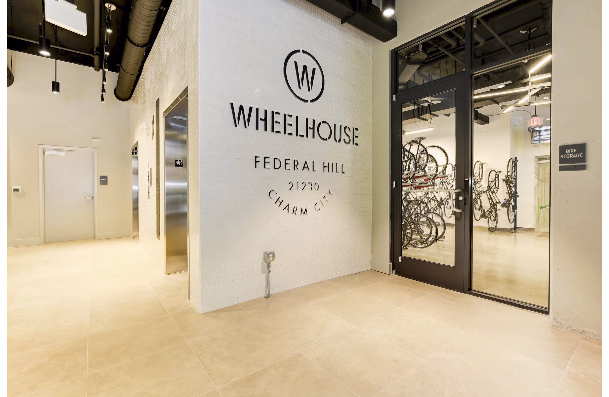 Modern clubhouse with billiards and lounge area at Wheelhouse Apartments, ideal for social gatherings and relaxation
