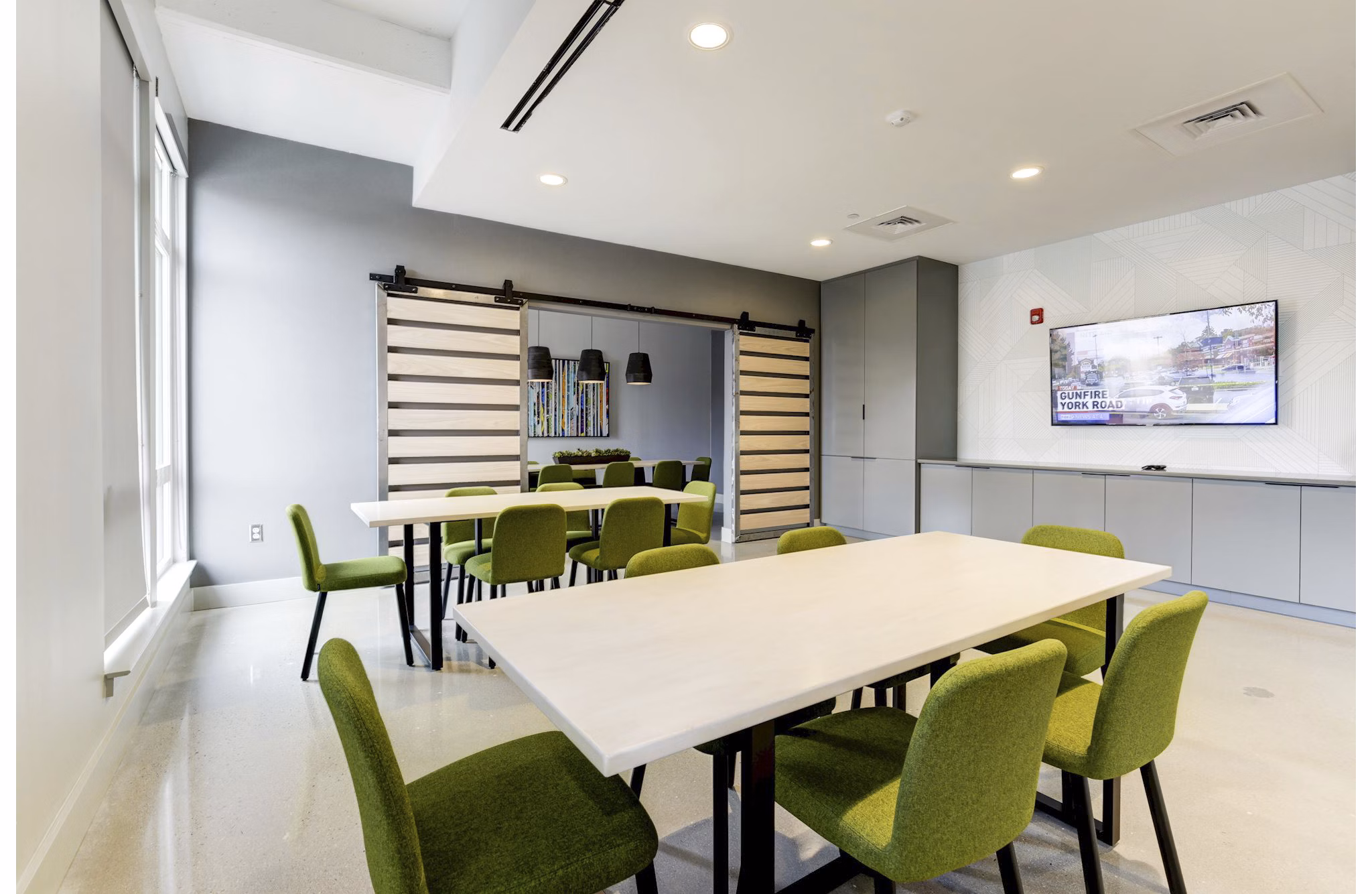 Elegant clubhouse featuring modern decor at Wheelhouse Apartments, perfect for gatherings and events