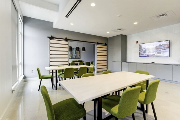 Elegant clubhouse featuring modern decor at Wheelhouse Apartments, perfect for gatherings and events