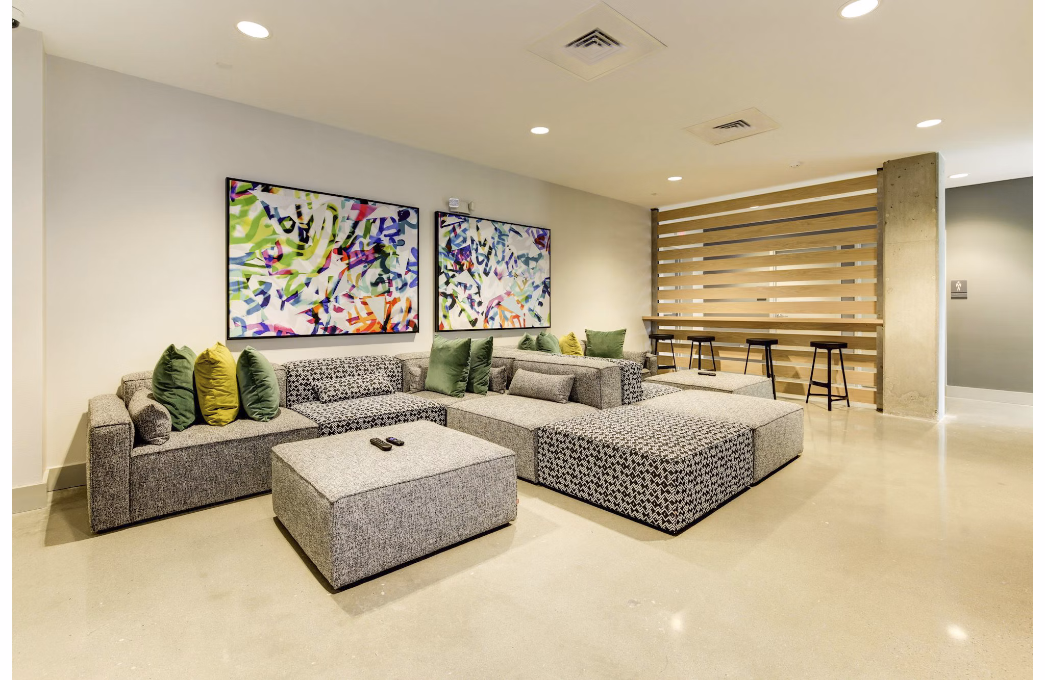 Cozy clubhouse featuring modern decor and seating spaces at Wheelhouse Apartments