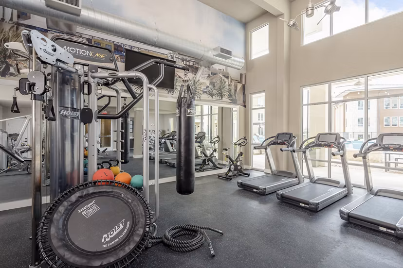 Modern fitness center with state-of-the-art equipment at The Upton at Longhorn Quarry Apartments