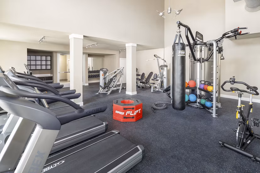 Fitness center with state-of-the-art equipment at The Upton at Longhorn Quarry Apartments, perfect for an active lifestyle