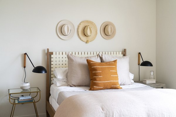 Cozy bedroom with modern furnishings at Linea Apartments, ideal for luxury living