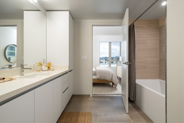 Elegant bathroom with modern fixtures at Linea Apartments