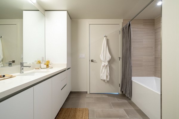 Modern bathroom with sleek fixtures at Linea Apartments in San Francisco offering luxury living by Greystar