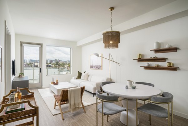 Dining area with modern furnishings and elegant lighting in Linea Apartments, a luxury property offering upscale living