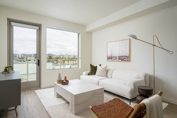 Linea Apartments: Modern living room with stylish furniture and natural light