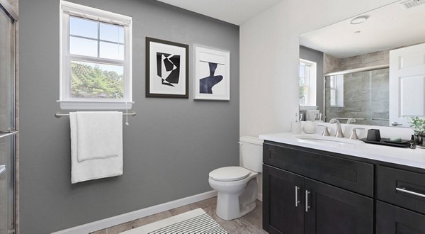 Modern bathroom with sleek fixtures at The Cornerstone Hauppauge Apartments