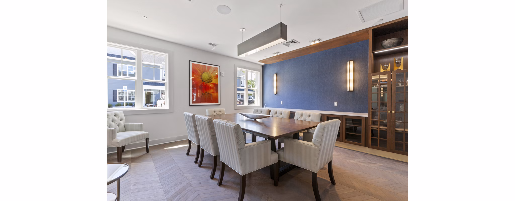 Meeting facility with conference tables and chairs at The Cornerstone Hauppauge Apartments