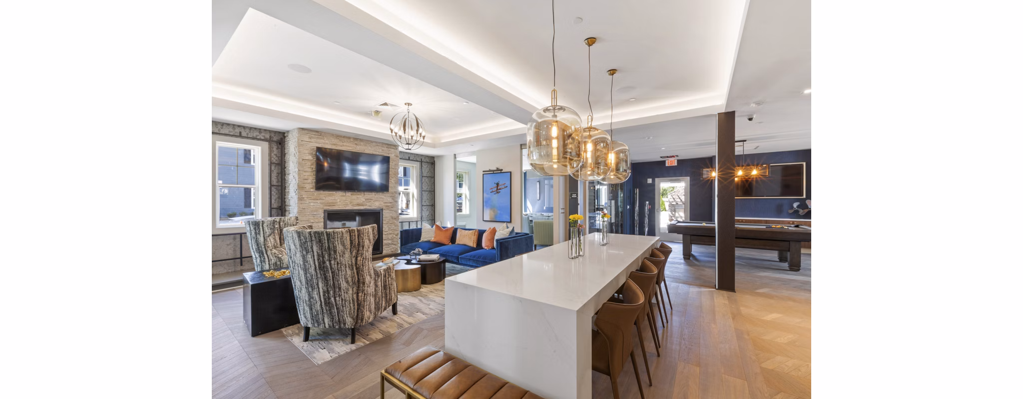 Clubhouse with modern decor and spacious seating at The Cornerstone Hauppauge Apartments