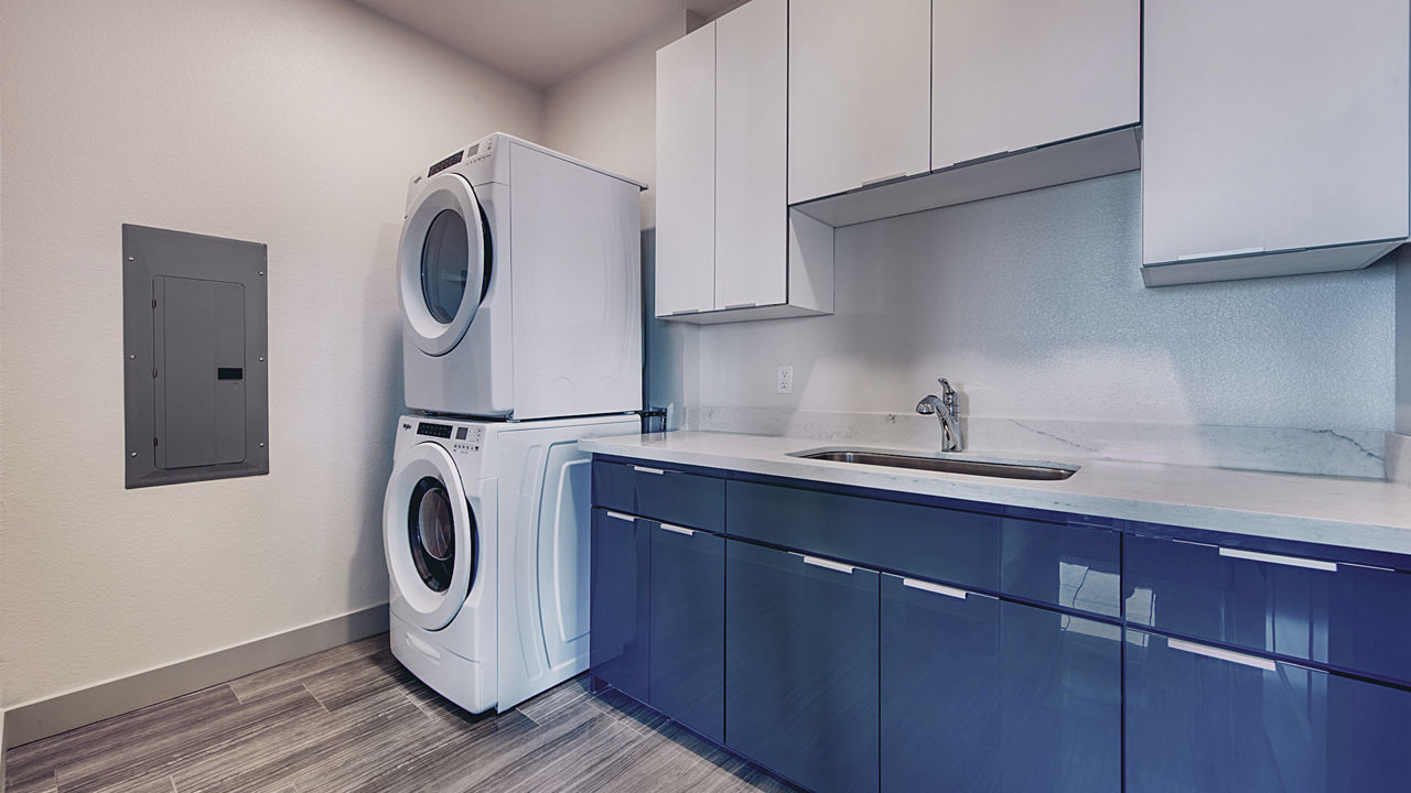 Laundry room at Aura Watermark