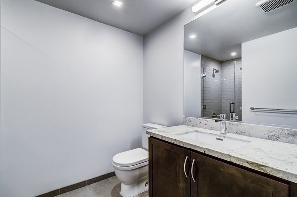 Luxurious bathroom with modern fixtures at 777 Tenn Apartments in Nashville