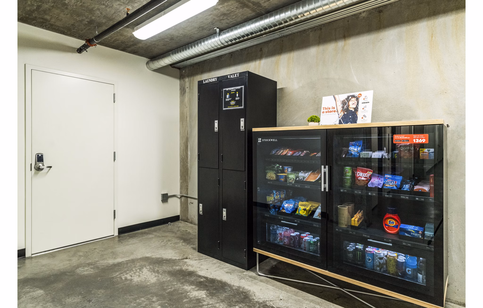 Clubhouse vending machine offering refreshments at 777 Tenn Apartments, luxury living with modern amenities in vibrant Nashville