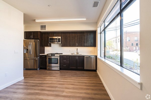 Dining room with elegant table and modern decor at 777 Tenn Apartments