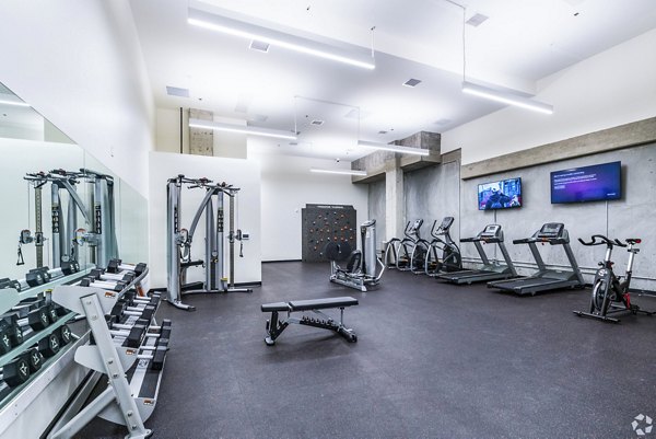 State-of-the-art fitness center at 777 Tenn Apartments with cardio and strength training equipment