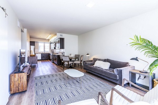 Spacious living room with modern furnishings at 777 Tenn Apartments, Nashville