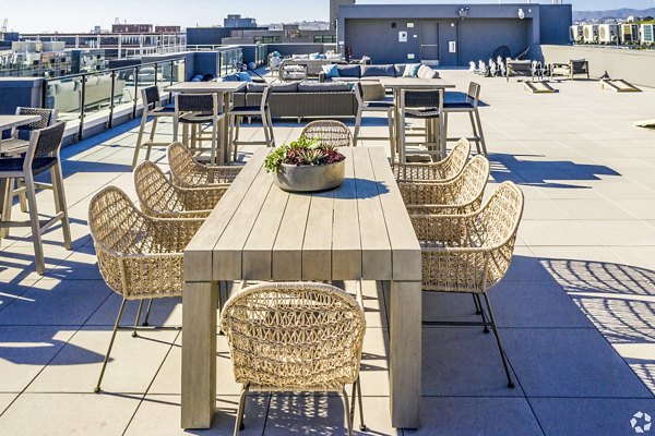 Modern grill area on the landscaped patio at 777 Tenn Apartments, perfect for outdoor gatherings in vibrant downtown