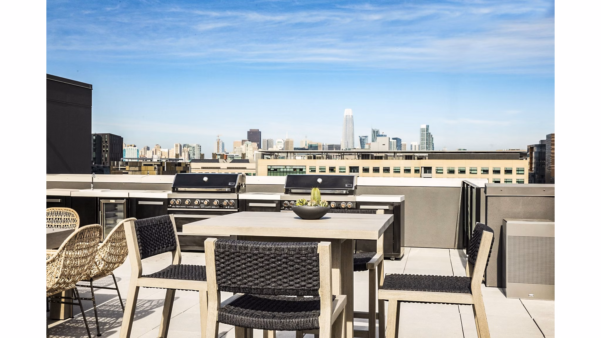 Inviting grill area on spacious patio at 777 Tenn Apartments, perfect for gatherings and relaxation in the heart of vibrant city living