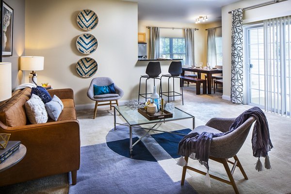 living room at Heritage at Bedford Springs Apartments
