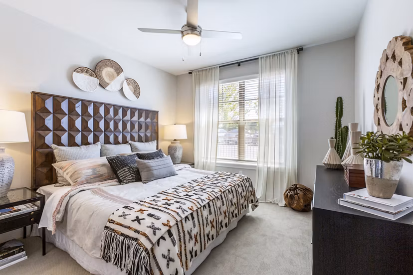 Cozy bedroom with modern furnishings at Overture Albuquerque Apartments for luxurious living