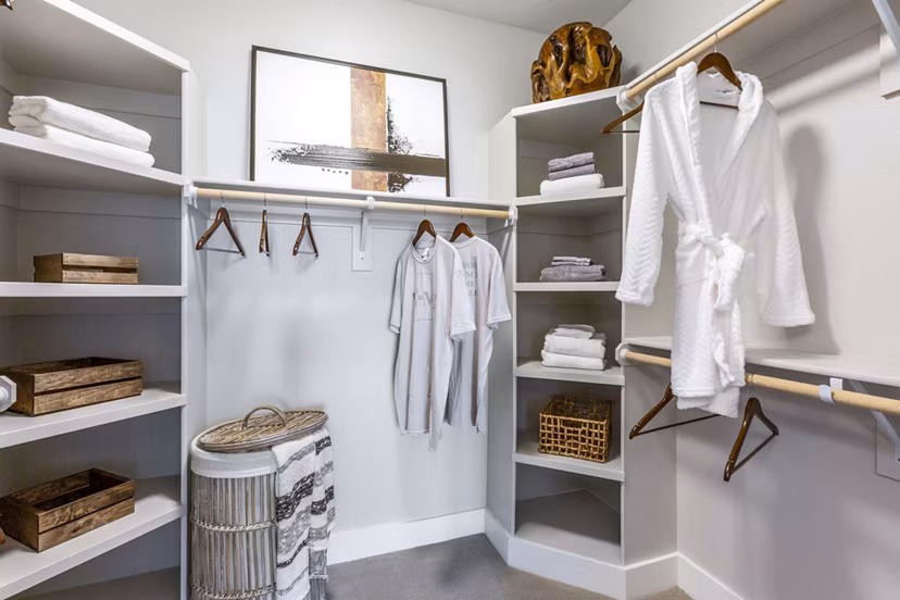 Bedroom closet with custom shelving at Overture Albuquerque Apartments, a luxury community by Greystar