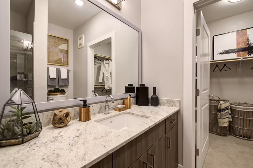 Bathroom with modern fixtures at Overture Albuquerque Apartments, a Greystar luxury community for active adults in New Mexico