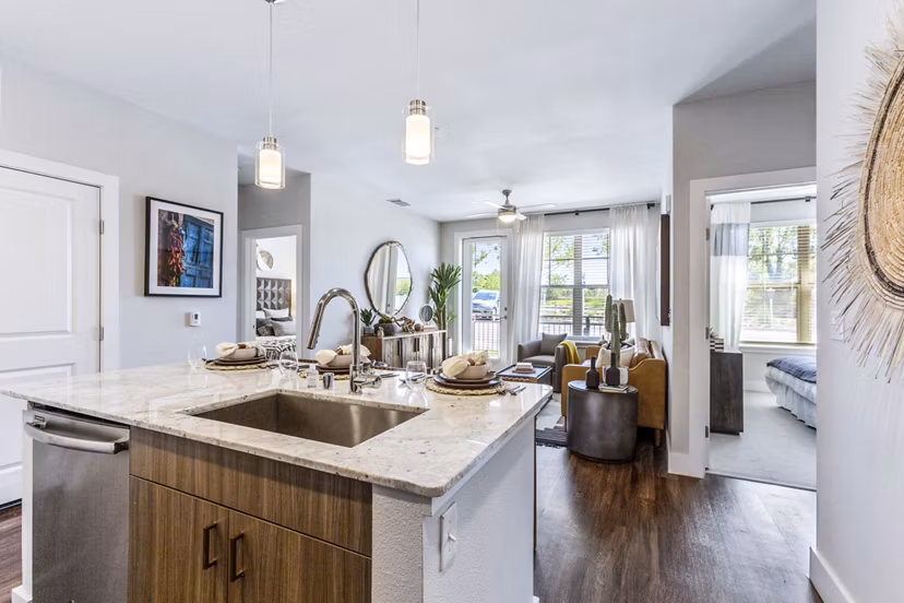 Modern kitchen with stainless steel appliances at Overture Albuquerque Apartments