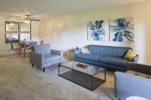 living room at Woods at Burnsville Apartments