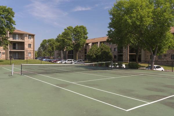 tennis court at Woods at Burnsville Apartments
