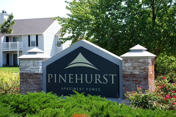 signage at Pinehurst Apartments