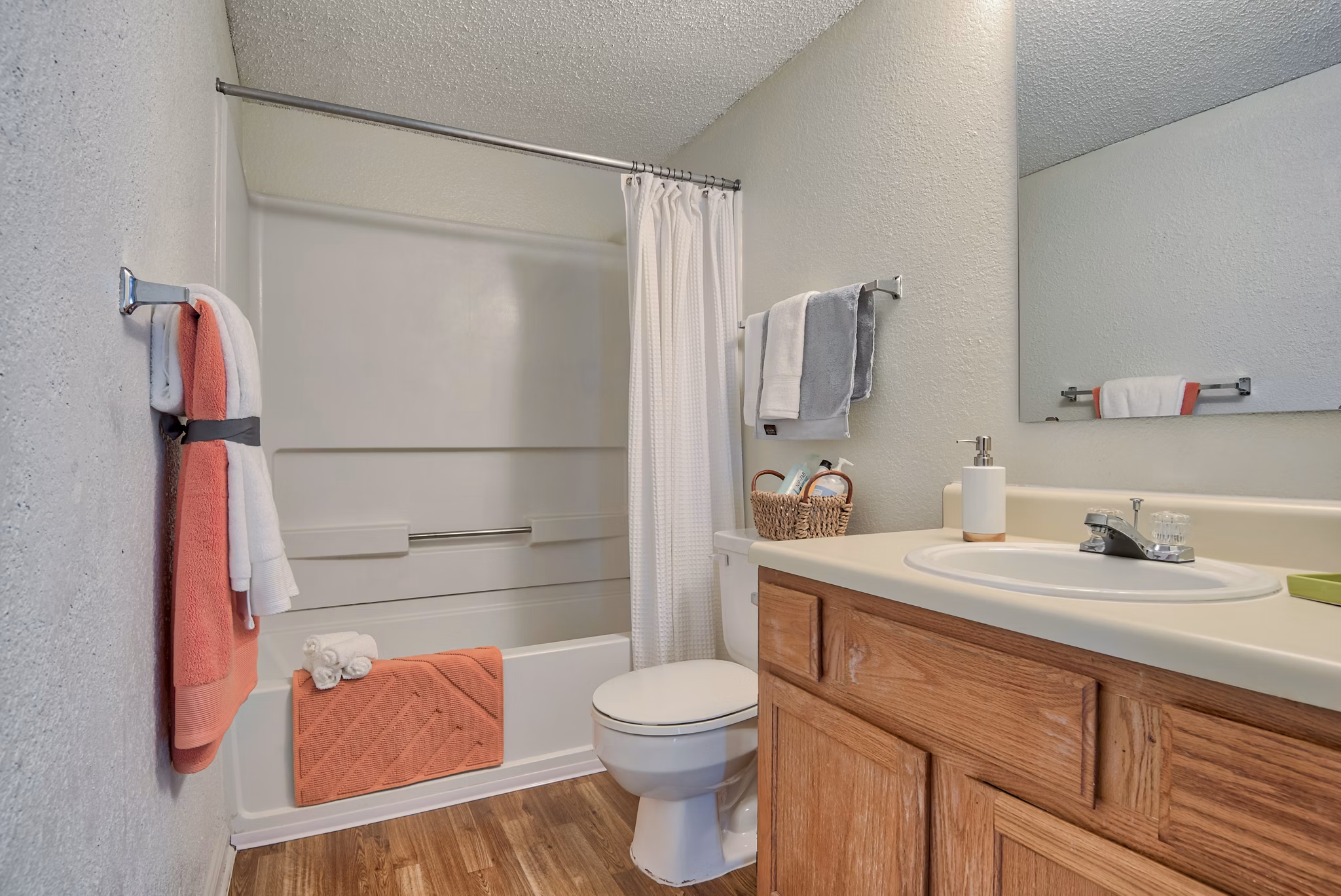 Modern bathroom with sleek fixtures at Pinehurst Apartments