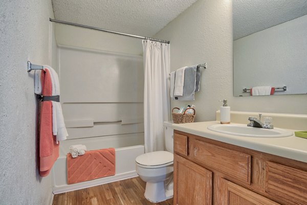 Modern bathroom with sleek fixtures at Pinehurst Apartments